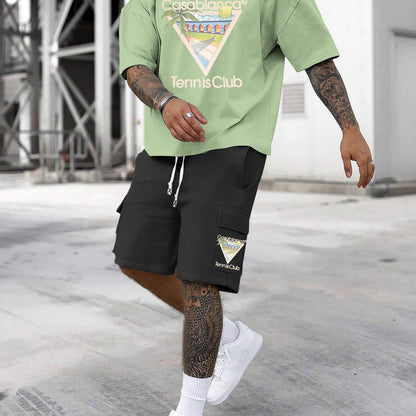 New Loose Fit Breathable Men's Crew Neck Short Sleeve T-Shirt and Workwear Style Multi-Pocket Shorts Set, Summer Casual Sportswear Two-Piece Outfit, Stylish Versatile Top and Pants for Both Men and Women