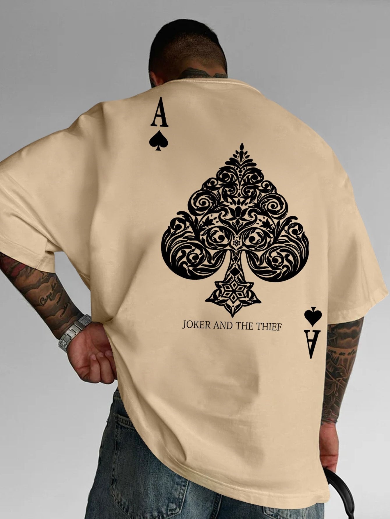 Men's Pink Street Style Graphic T-Shirt - Joker and the Thief Design, Loose Fit, Round Neck, Short Sleeve, Geometric Pattern, Machine Washable, Summer Casual Wear for Adults