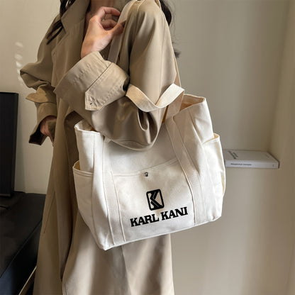 Karl Kani Women'S Large Capacity Tote Bag - Lightweight Durable Polyester Shoulder Bag with Zipper Closure, Stylish Black & White Print Design, Perfect for Shopping, Commuting, and Travel, Versatile Carryall | Minimalist Desi