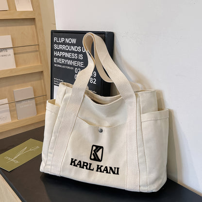 Karl Kani Women'S Large Capacity Tote Bag - Lightweight Durable Polyester Shoulder Bag with Zipper Closure, Stylish Black & White Print Design, Perfect for Shopping, Commuting, and Travel, Versatile Carryall | Minimalist Desi