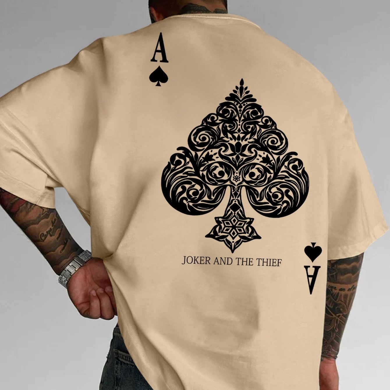 Men's Pink Street Style Graphic T-Shirt - Joker and the Thief Design, Loose Fit, Round Neck, Short Sleeve, Geometric Pattern, Machine Washable, Summer Casual Wear for Adults